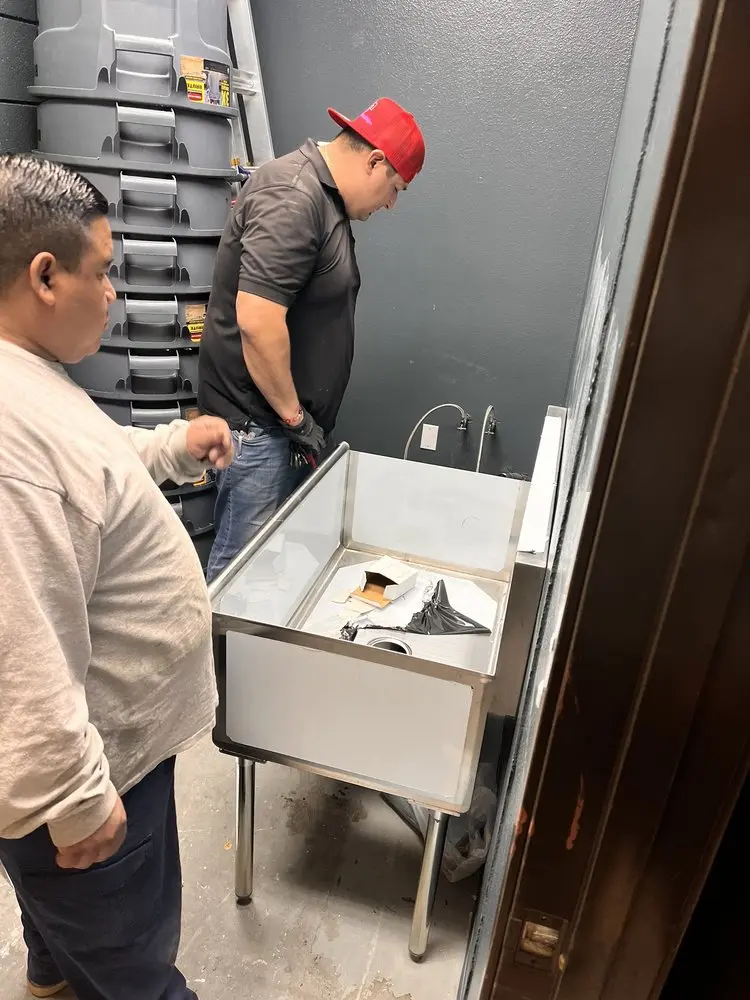 Commercial plumbing and sink installation in Abrams